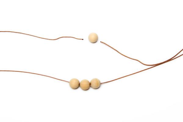 Podtácka z drevených korálikov