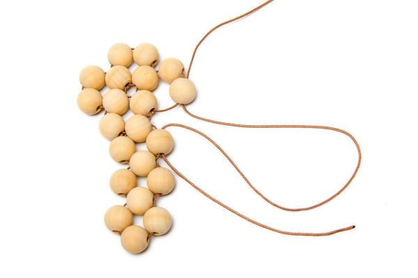 Podtácka z drevených korálikov